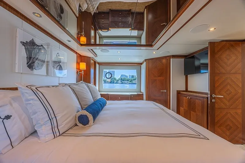 Slide: The Image of Luxurious bedroom interior of 2018 Ocean Alexander 85 E yacht with elegant wood finishes. - 31