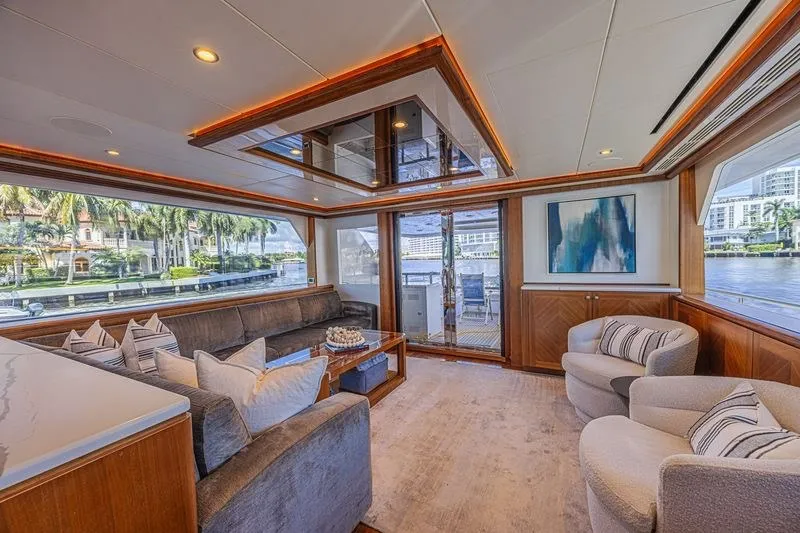 Slide: The Image of Luxurious interior of 2018 Ocean Alexander 85 E yacht with elegant seating and large windows. - 19