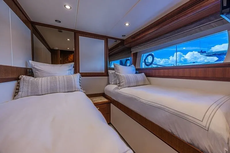 Slide: The Image of Luxurious cabin interior of 2018 Ocean Alexander 85 E yacht with twin beds and ocean view. - 37