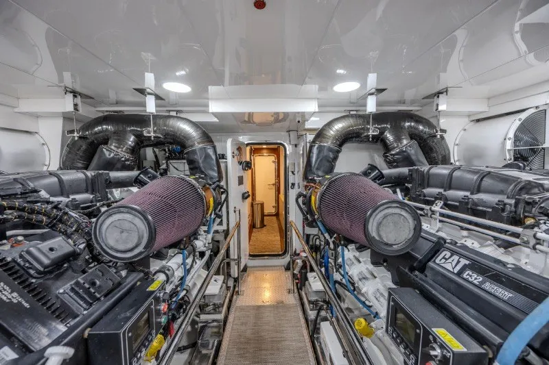 Slide: The Image of Engine room of 2018 Ocean Alexander 85 E yacht, featuring dual CAT engines. - 47