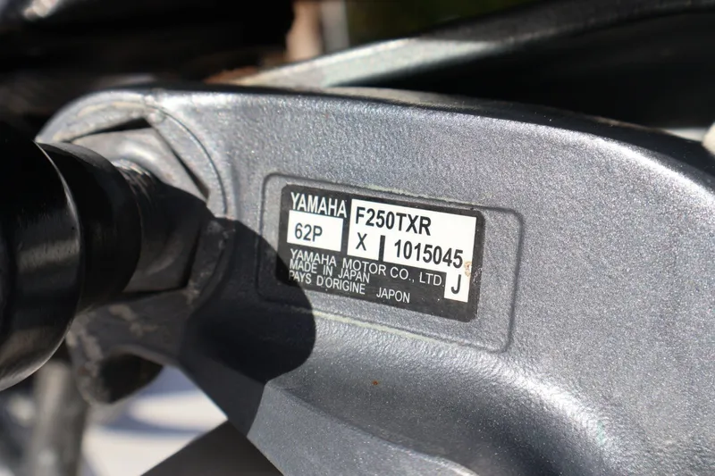 Slide: The Image of Close-up of Yamaha F250TXR engine label on 1989 Mako 231 Center Console boat. - 22