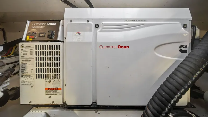 Slide: The Image of Engine Room with Cummins Onan Generator - 50