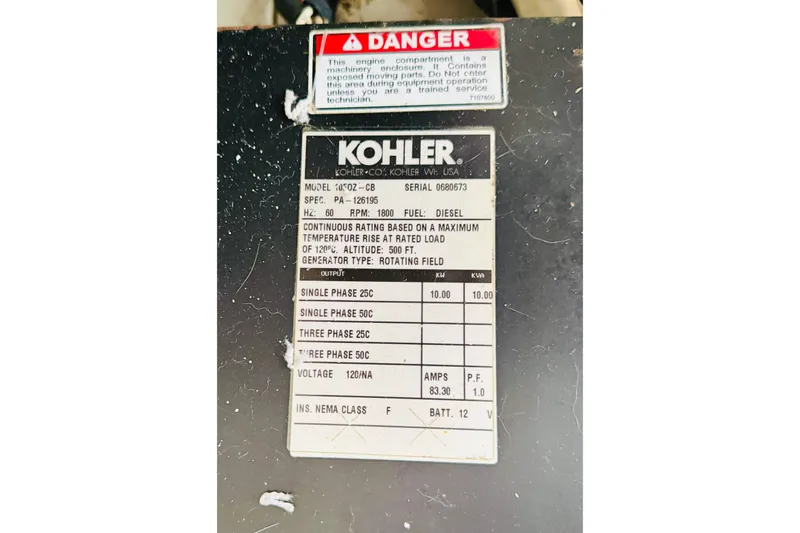 Slide: The Image of Kohler generator label on 2001 Carver 444 Cockpit Motor Yacht, model 10/0Z-CB, diesel engine. - 28