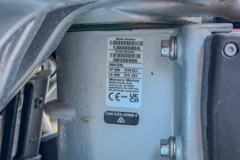 Slide: The Image of Label on a 2026 Monterey Elite 30 OB engine, displaying model and serial numbers. - 81
