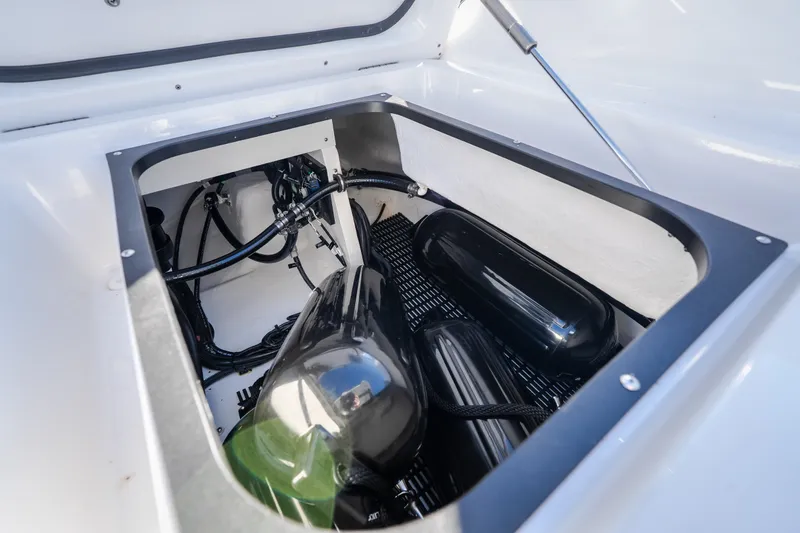 Slide: The Image of Storage compartment of 2026 Monterey Elite 30 OB boat, featuring sleek design and equipment. - 42