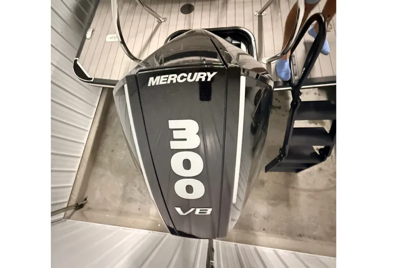 Slide: The Image of Mercury 300 V8 engine on 2025 Sylvan G3 CLZ DC boat, docked indoors. - 19