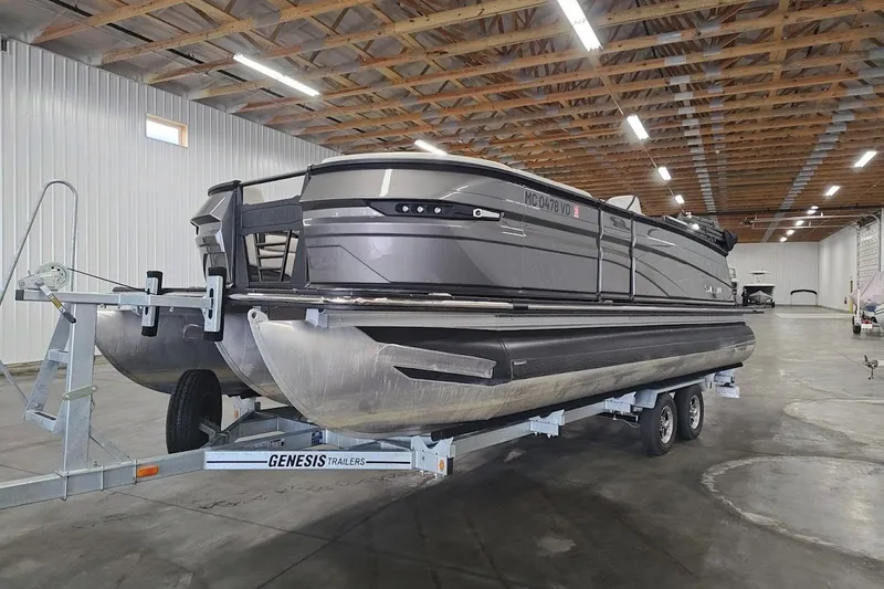 Slide: The Image of 2025 Sylvan G3 CLZ DC pontoon boat on Genesis trailer in warehouse. - 7