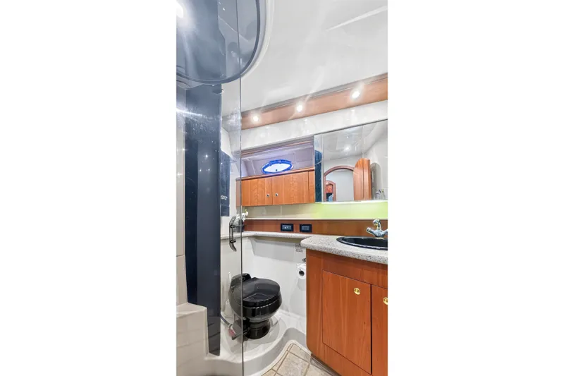 Slide: The Image of Luxurious bathroom in 2003 Cruisers Yachts 4450 Express Motoryacht with modern fixtures. - 40
