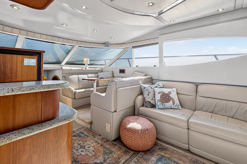 Slide: The Image of Luxurious interior of 2003 Cruisers Yachts 4450 Express Motoryacht with plush seating and elegant decor. - 31
