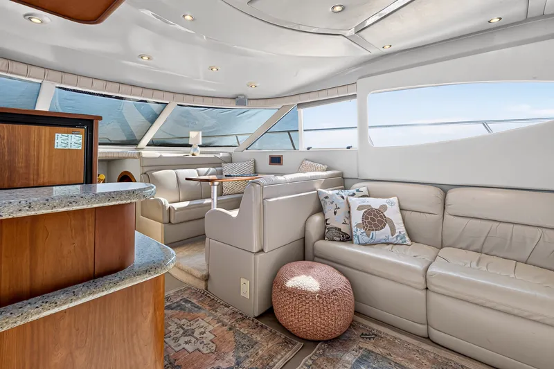 Slide: The Image of Luxurious interior of 2003 Cruisers Yachts 4450 Express Motoryacht with plush seating and elegant decor. - 28