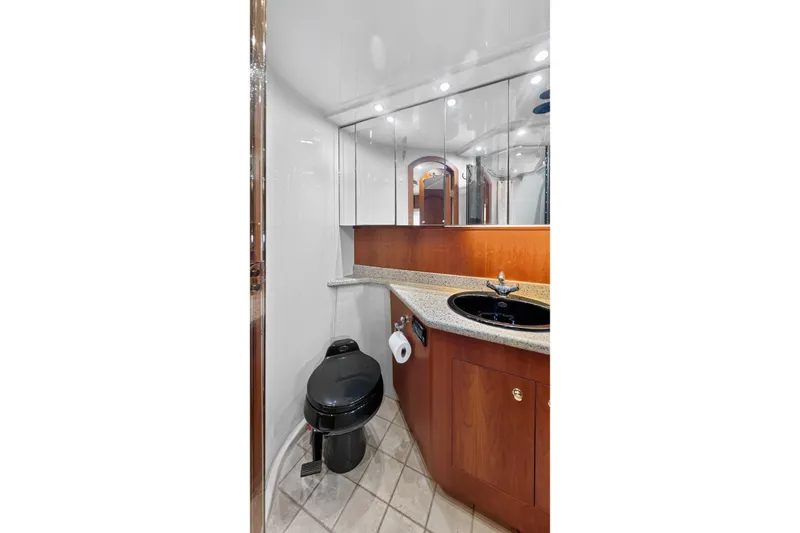 Slide: The Image of Luxurious bathroom in 2003 Cruisers Yachts 4450 Express Motoryacht with modern fixtures. - 57