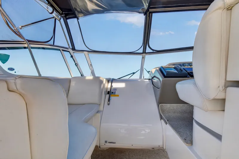 Slide: The Image of Interior view of 2003 Cruisers Yachts 4450 Express Motoryacht cockpit with seating and controls. - 16