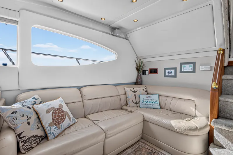 Slide: The Image of Luxurious interior of 2003 Cruisers Yachts 4450 Express Motoryacht with plush seating and nautical decor. - 30