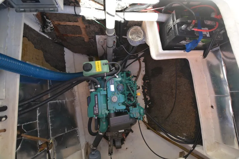 Slide: The Image of Engine compartment of a 2006 Fountaine Pajot LAVEZZI 40 catamaran with visible battery and wiring. - 40