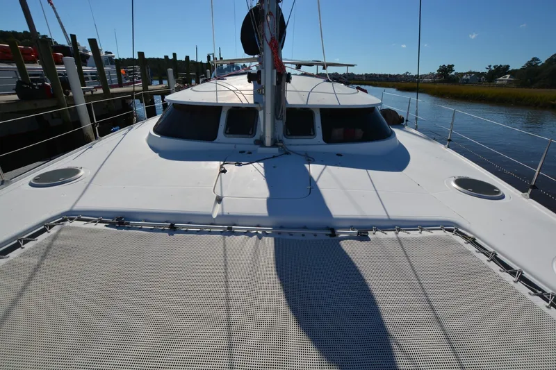 Slide: The Image of 2006 Fountaine Pajot LAVEZZI 40 catamaran docked at marina, sunny day. - 10