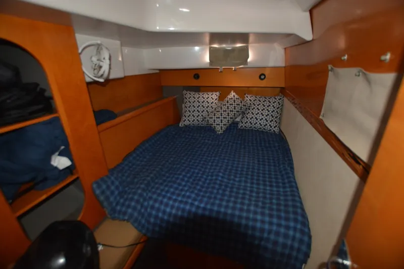 Slide: The Image of Cozy cabin interior of 2006 Fountaine Pajot LAVEZZI 40 catamaran with blue bedding. - 34