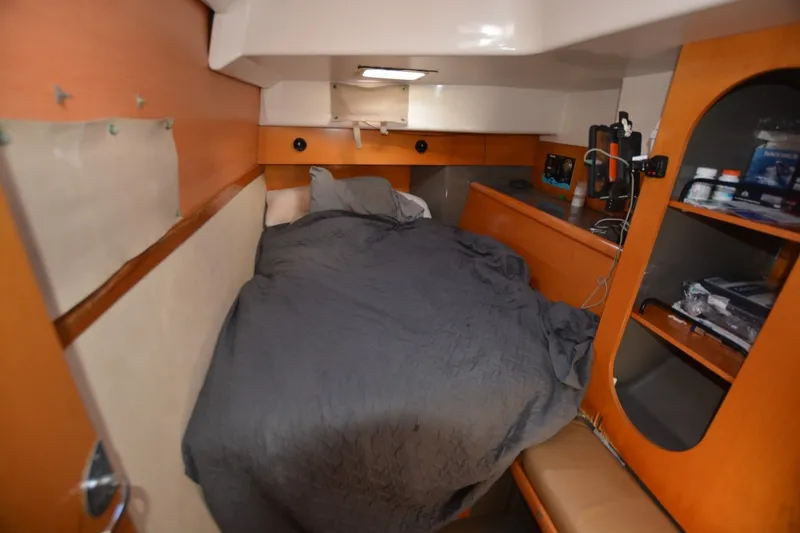 Slide: The Image of Cozy cabin interior of 2006 Fountaine Pajot LAVEZZI 40 catamaran with bed and storage. - 30