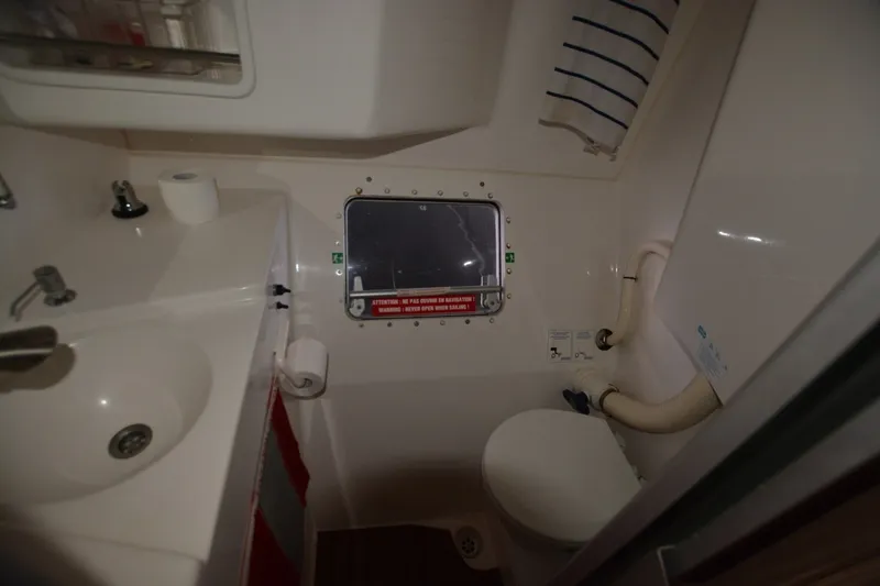 Slide: The Image of Bathroom interior of 2006 Fountaine Pajot LAVEZZI 40 catamaran with sink and toilet. - 35