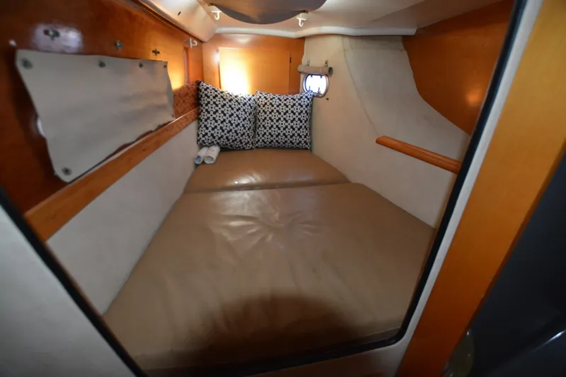 Slide: The Image of Cozy cabin interior of 2006 Fountaine Pajot LAVEZZI 40 with cushions and porthole. - 36