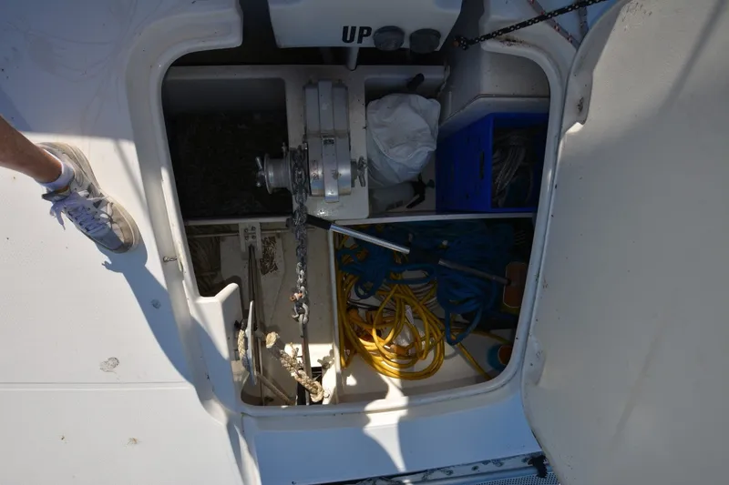 Slide: The Image of Storage compartment of a 2006 Fountaine Pajot LAVEZZI 40 catamaran with ropes and equipment. - 38
