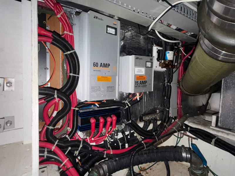 Slide: The Image of Electrical systems and wiring in a yacht's engine room. - 30