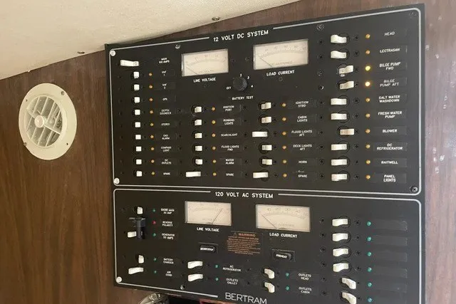 Slide: The Image of Electrical control panel on a 1979 Bertram 31 Flybridge Cruiser boat. - 11