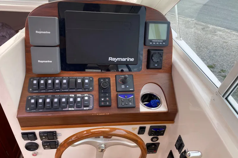 Slide: The Image of Boat control panel with Raymarine electronics, True North 34, 2008 model. - 7