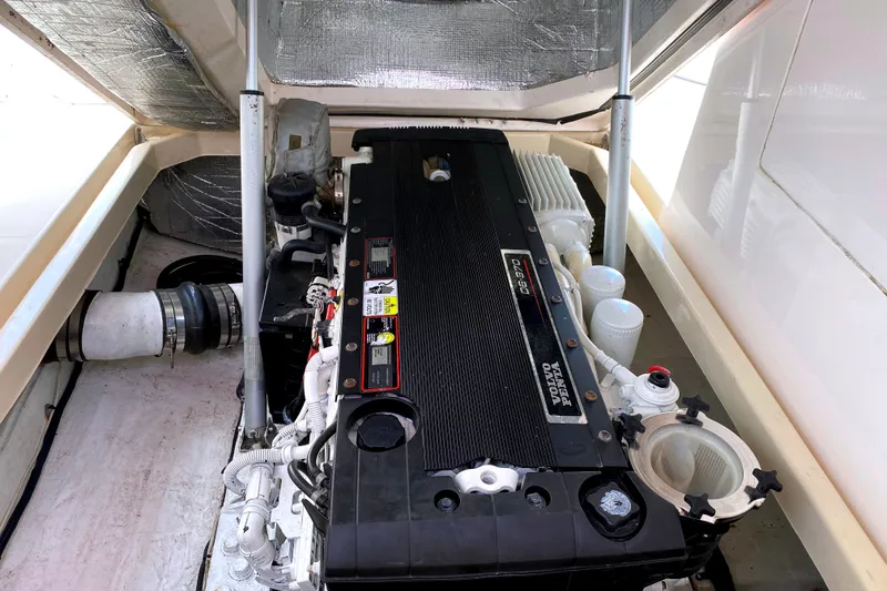 Slide: The Image of Engine compartment of a 2008 True North 34 boat, featuring a Volvo Penta engine. - 11