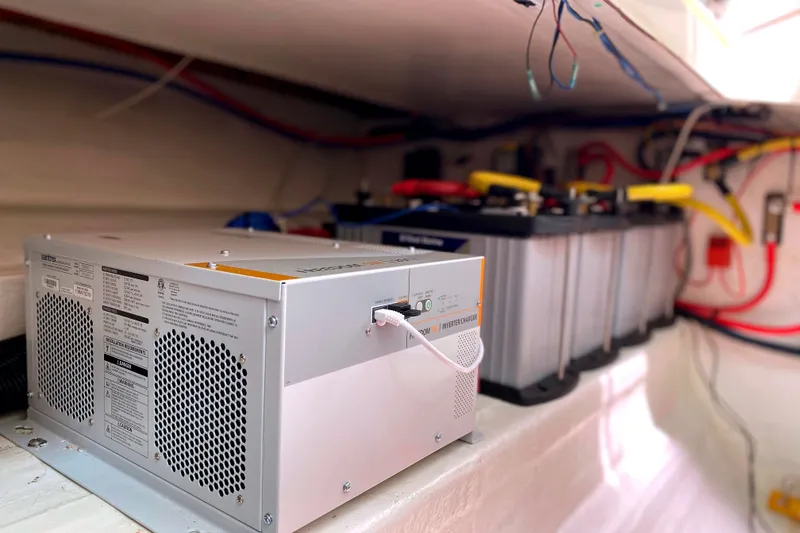 Slide: The Image of Electrical system with inverter charger and batteries in 2008 True North 34 boat. - 15