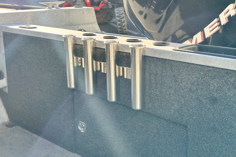 Slide: The Image of Rod holders on a 2008 Jetcraft 1925 Adventurer boat, featuring a sleek metallic finish. - 13