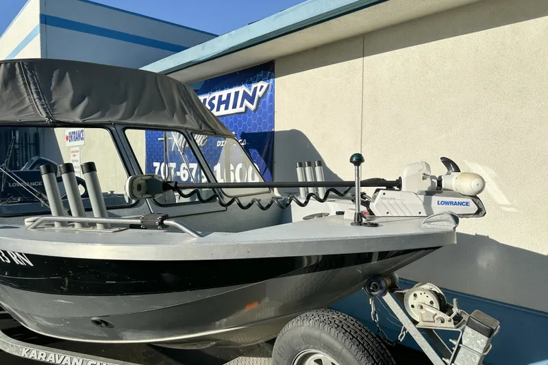 Slide: The Image of 2008 Jetcraft 1925 Adventurer boat with Lowrance equipment on a trailer. - 3