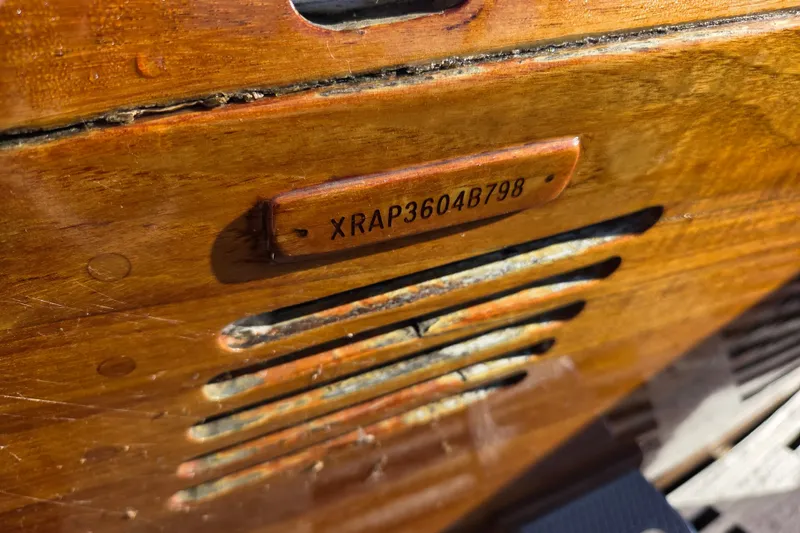Slide: The Image of Close-up of wooden panel with serial number XRAP3604B798, Able Wolf Class 36, 1998. - 34