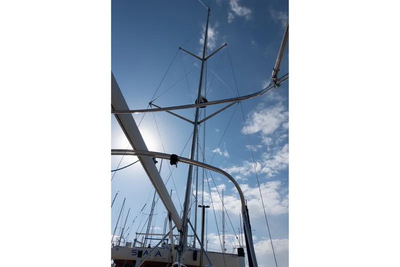 Slide: The Image of Sailboat mast of 2003 Hunter 356 against a bright blue sky. - 8