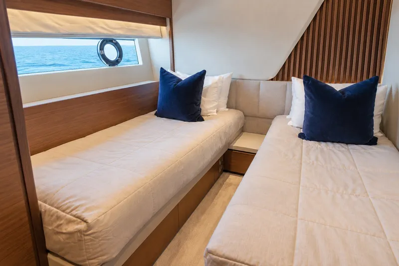 Slide: The Image of Luxurious cabin interior of 2021 Princess Y85 yacht with twin beds and ocean view. - 58