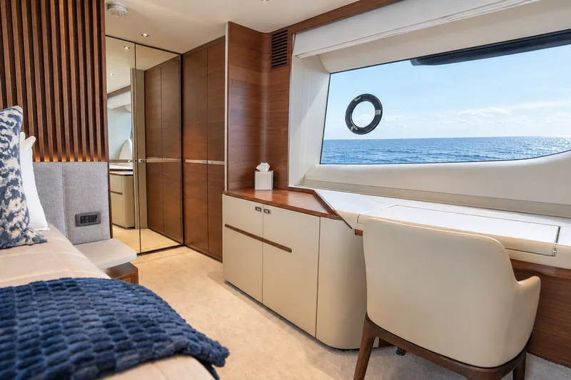 Slide: The Image of Luxurious interior of 2021 Princess Y85 yacht with ocean view through large window. - 45