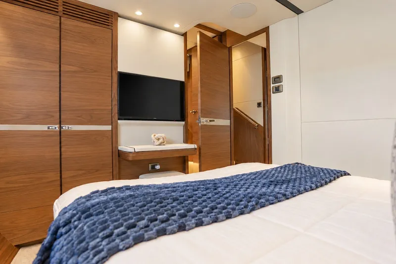 Slide: The Image of Luxurious interior of 2021 Princess Y85 yacht with wood finishes and modern amenities. - 53