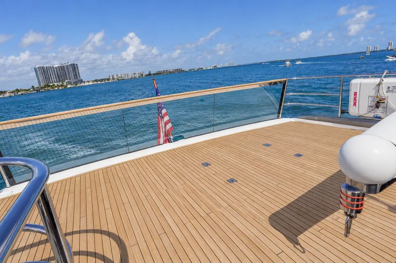 Slide: The Image of Luxurious 2021 Princess Y85 yacht deck with ocean view and American flag. - 18