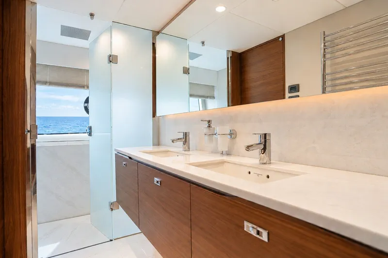 Slide: The Image of Luxurious bathroom on 2021 Princess Y85 yacht with dual sinks and ocean view. - 46