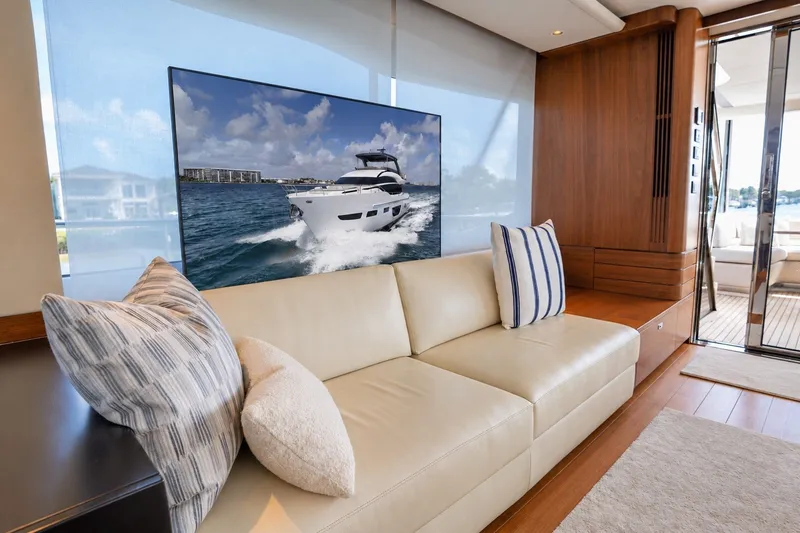 Slide: The Image of Luxurious interior of 2021 Princess Y85 yacht with elegant seating and scenic view. - 28