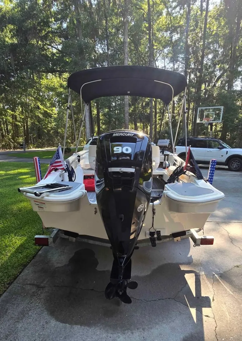 Slide: The Image of A 2021 Boston Whaler 160 Super Sport on a trailer outdoors. - 4