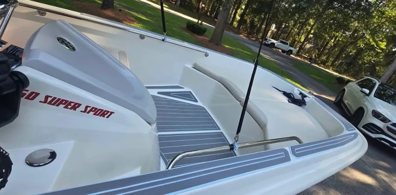 Slide: The Image of The image shows the deck of a 2021 Boston Whaler 160 Super Sport with gray accents. - 3