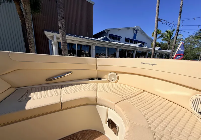 Slide: The Image of Interior view of a 2019 Chris-Craft Launch 28 GT OB with beige upholstery. - 38