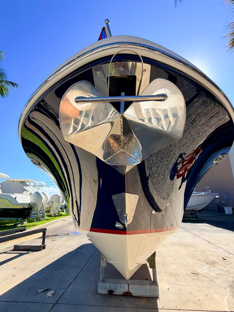 Slide: The Image of Bow view of a 2019 Chris-Craft Launch 28 GT OB with a shiny hull. - 19