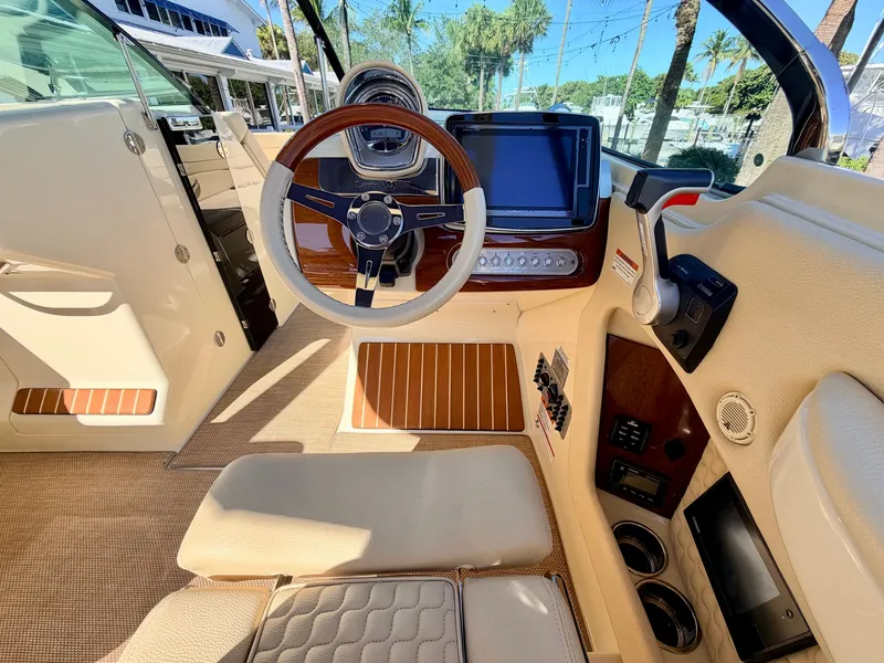 Slide: The Image of Interior of a 2019 Chris-Craft Launch 28 GT OB with elegant wood accents. - 49