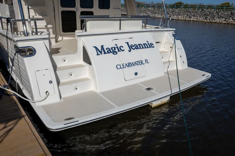 Slide: The Image of Stern view of 2019 Marlow Explorer 49E yacht, "Magic Jeannie," docked in Clearwater, FL. - 15