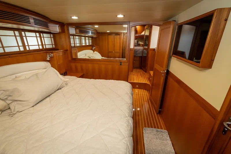 Slide: The Image of Luxurious cabin interior of 2019 Marlow Explorer 49E yacht with wooden finishes. - 56