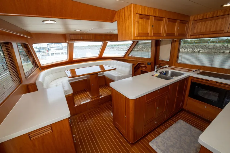 Slide: The Image of Luxurious interior of 2019 Marlow Explorer 49E yacht with wood finish and modern amenities. - 39
