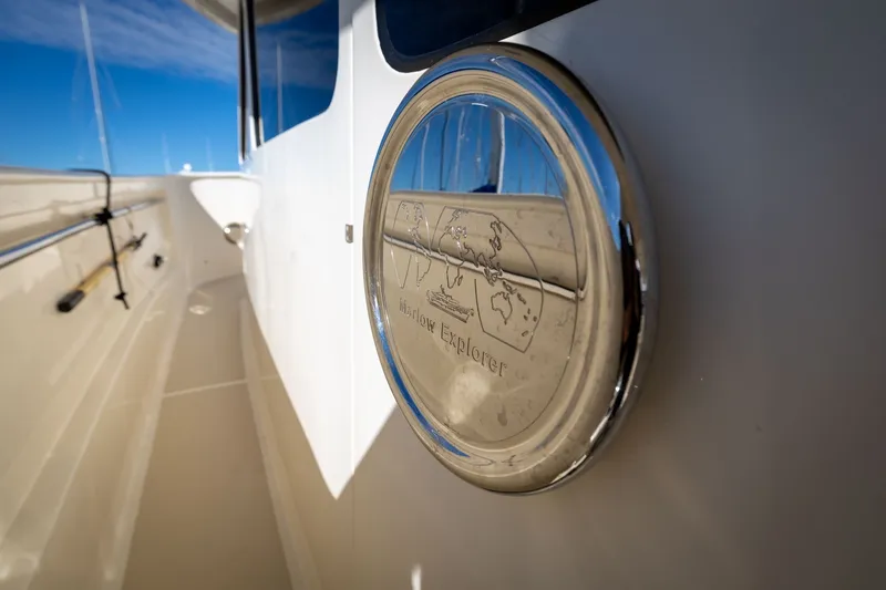 Slide: The Image of 2019 Marlow Explorer 49E yacht detail with logo, showcasing sleek design and craftsmanship. - 25