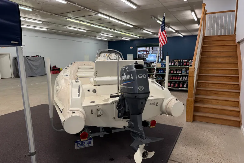 Slide: The Image of 2004 Nautica RIB 15 Widebody boat with Yamaha 60 engine in showroom. - 17