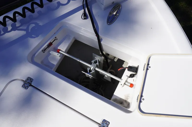 Slide: The Image of Open storage compartment on 2024 Sportsman Masters 267OE Bay Boat deck. - 41